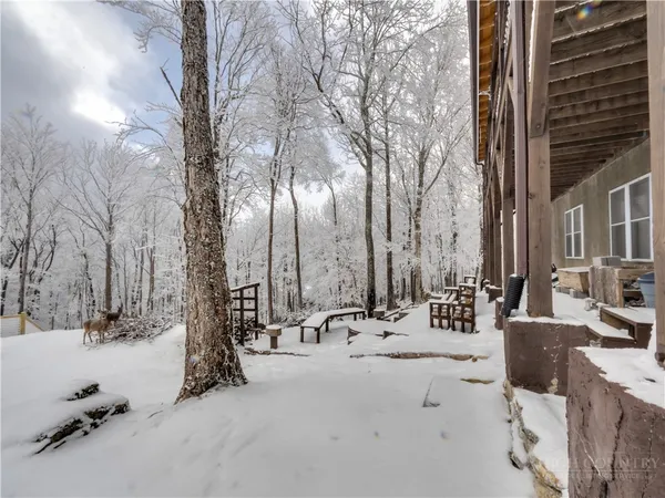 a view of roof with seating space