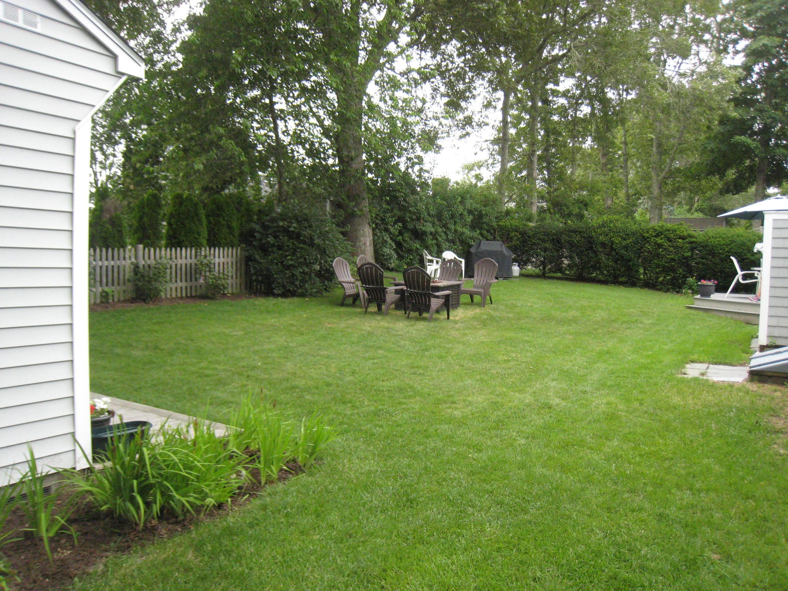 52 Alma Road Mashpee, MA 02649 - Photo 8 of 23 Level back yard