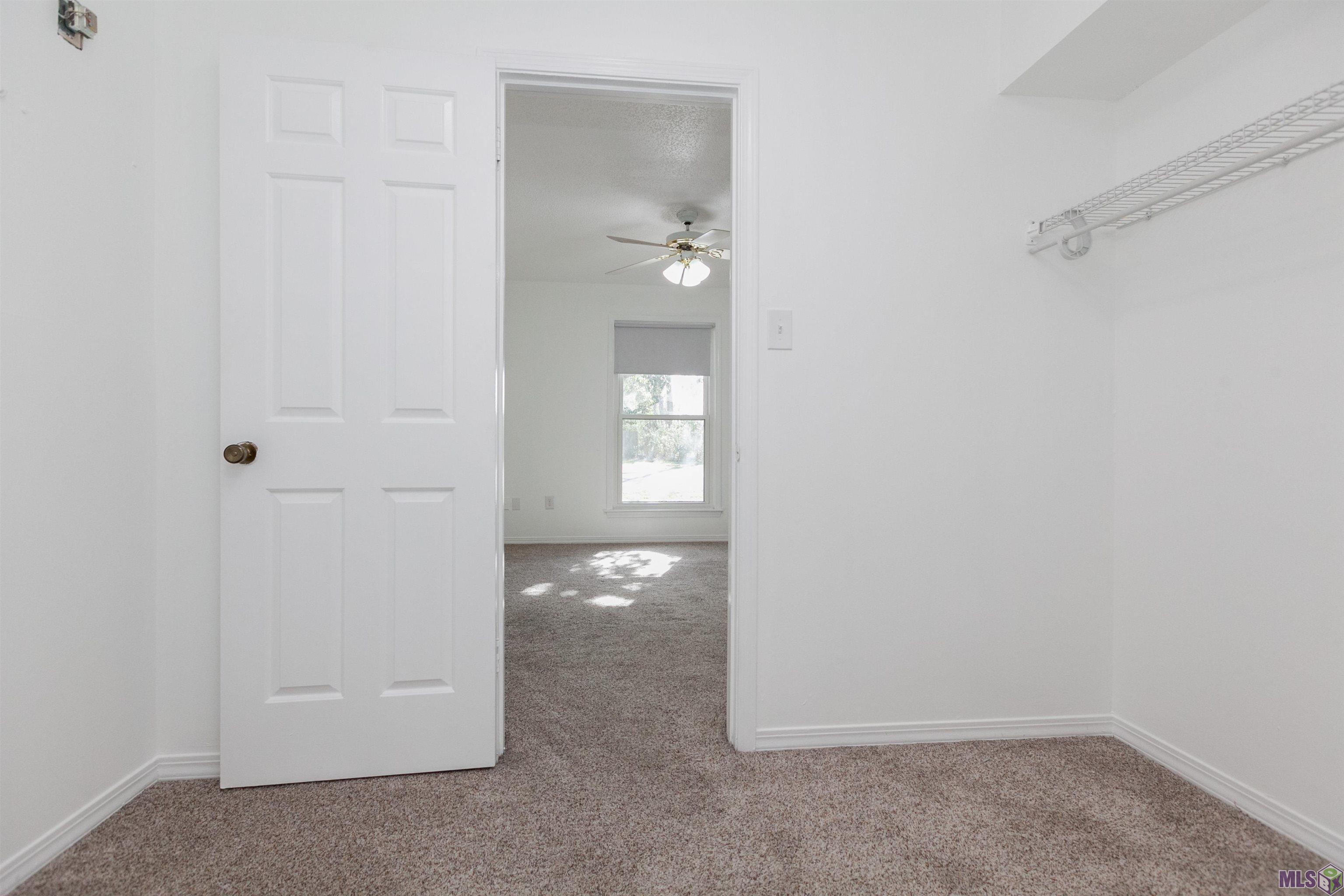 2448 Brightside Drive Baton Rouge, LA 70820 - Photo 13 of 22 Walk-in closet to bedroom