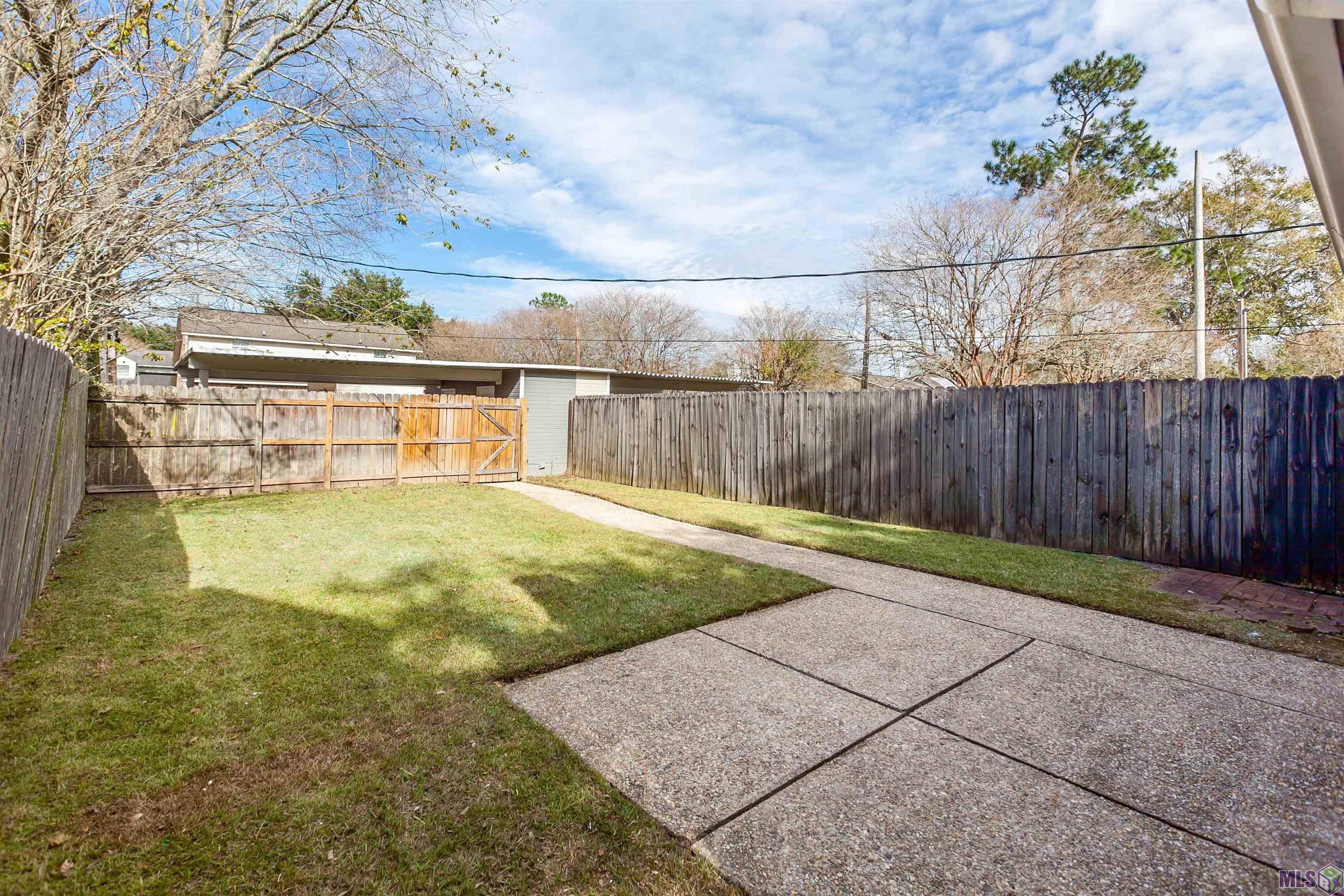 2448 Brightside Drive Baton Rouge, LA 70820 - Photo 20 of 22 Fenced backyard with patio