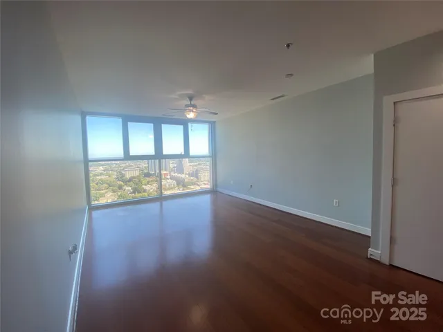 a view of a city with tall buildings