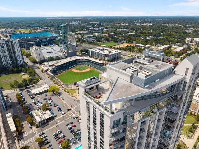 a view of swimming pool with outdoor seating