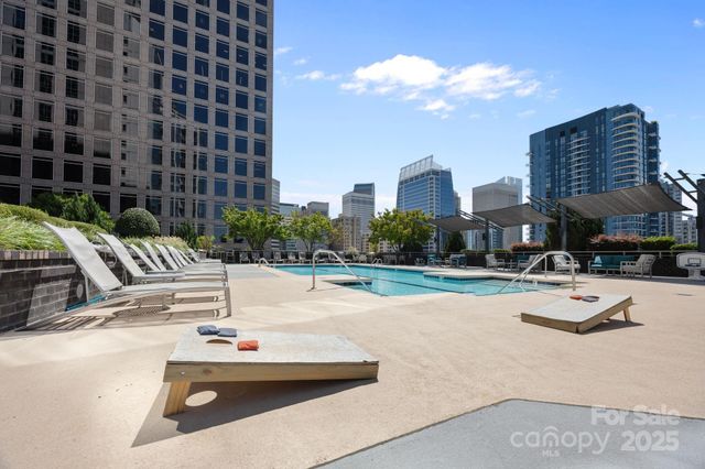 a view of a patio with swimming pool