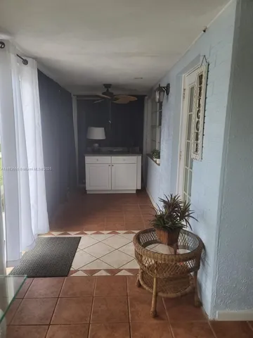 a room with furniture and window