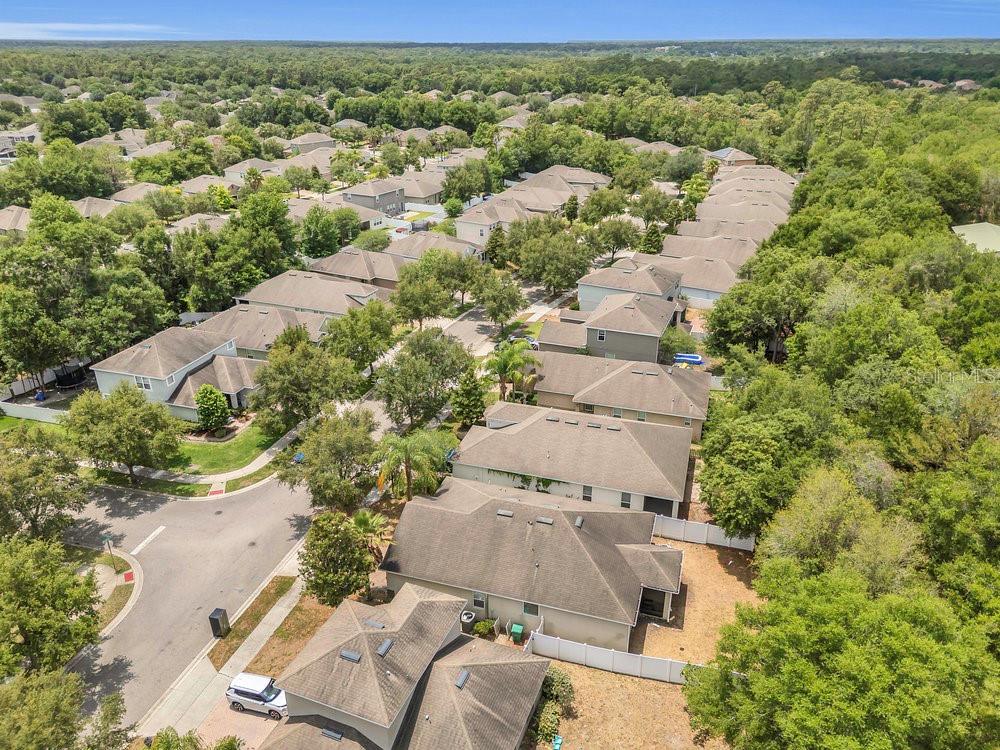 680 Preakness Circle Deland, FL 32724 - Photo 26 of 28 an aerial view of a house with a yard