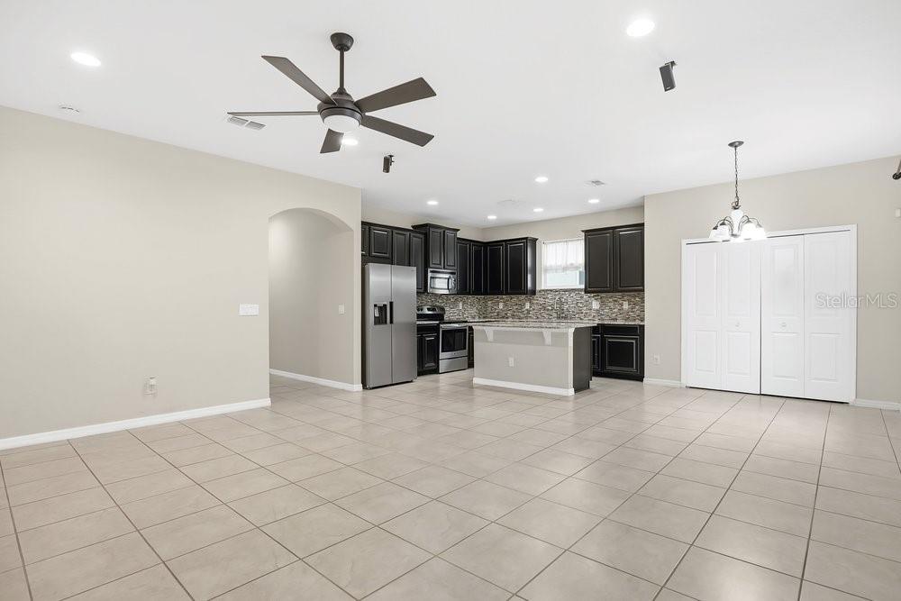 680 Preakness Circle Deland, FL 32724 - Photo 6 of 28 a view of kitchen with cabinets and window