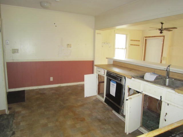2552 Anderson Drive Macon, GA 31206 - Photo 4 of 12 a kitchen with stainless steel appliances granite countertop a stove a sink and a microwave