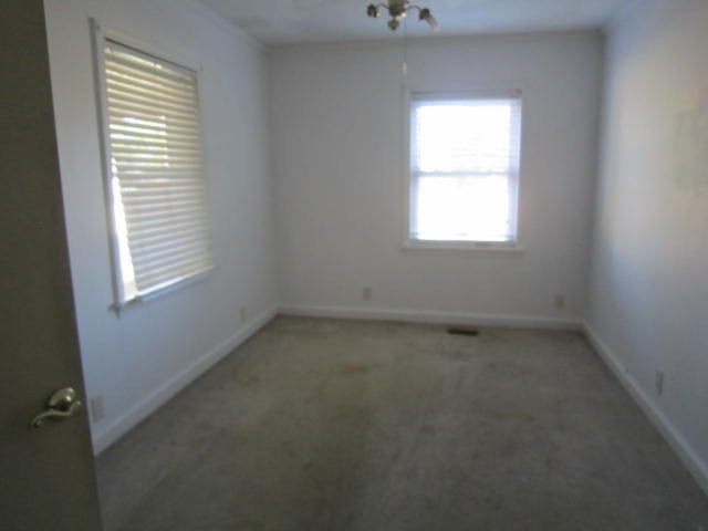 2552 Anderson Drive Macon, GA 31206 - Photo 5 of 12 an empty room with a window