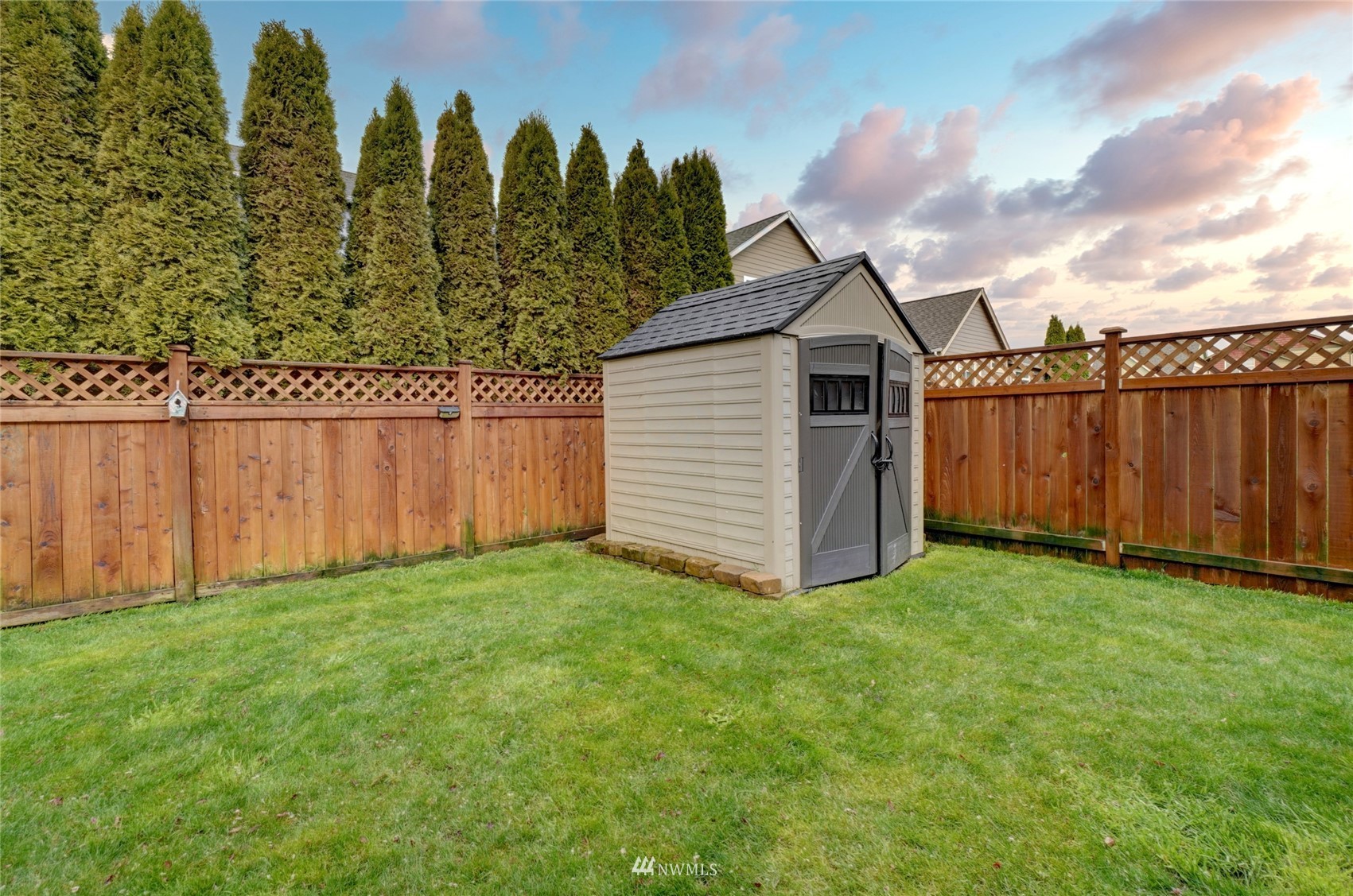 7053 Radius Loop Southeast Lacey, WA 98513 - Photo 19 of 34 a view of a backyard with green space
