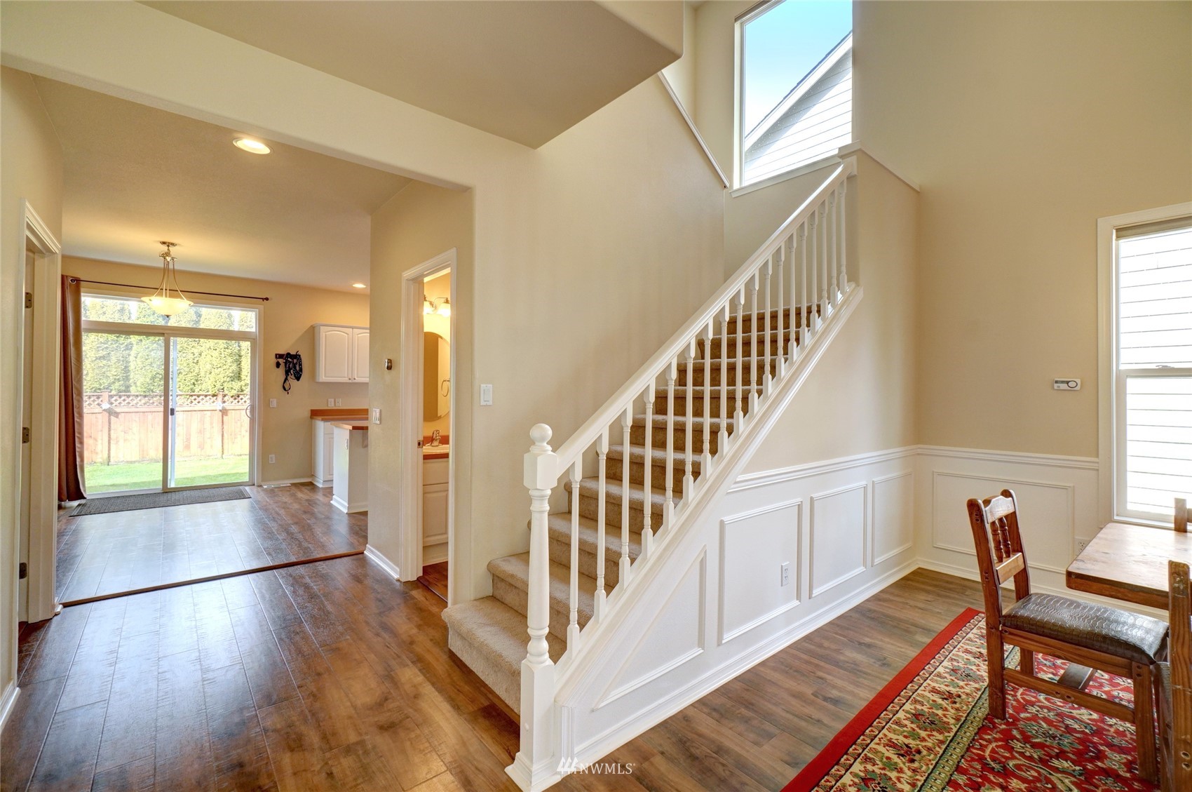 7053 Radius Loop Southeast Lacey, WA 98513 - Photo 21 of 34 a view of entryway with wooden floor and stairs
