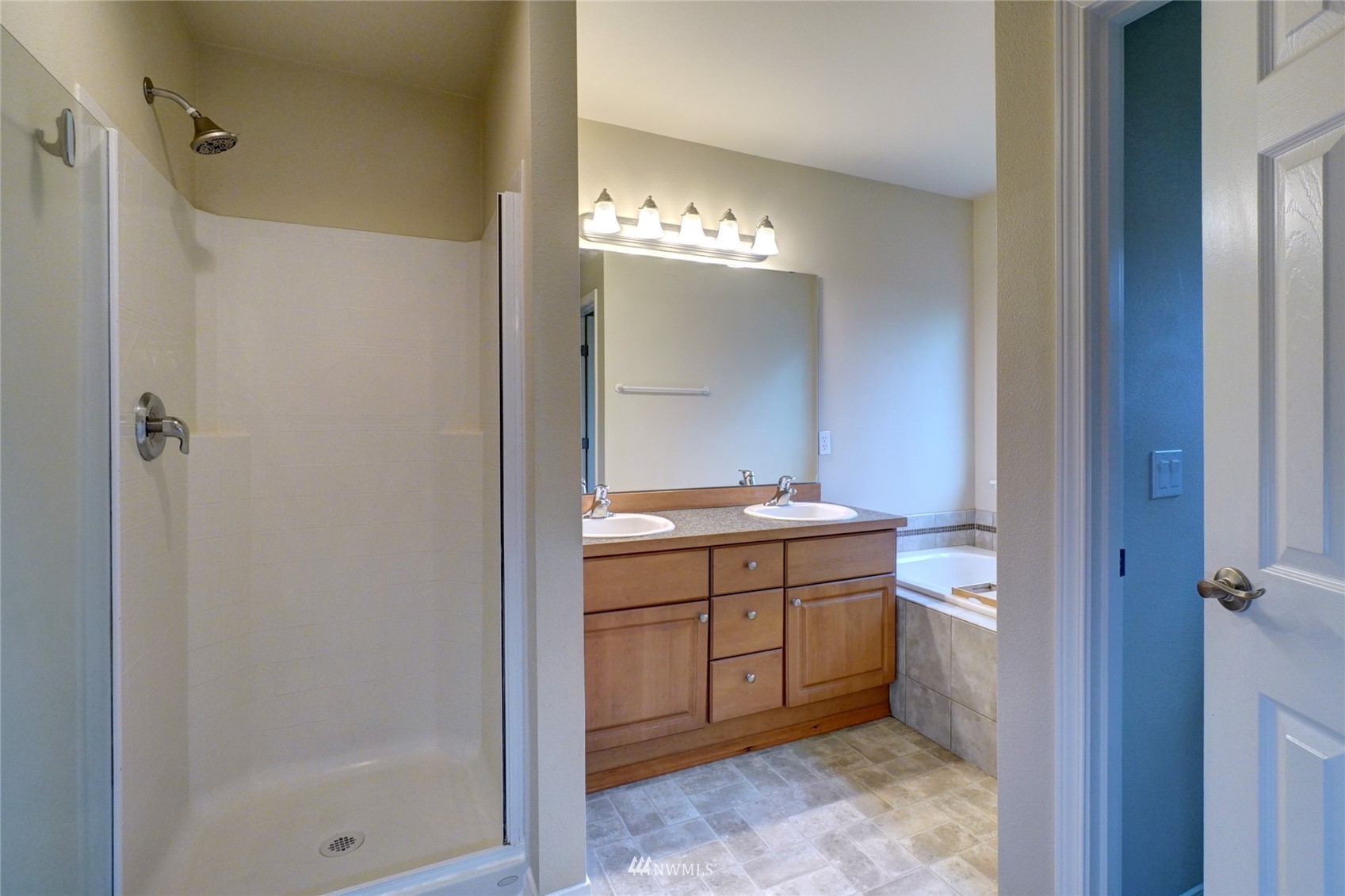 7053 Radius Loop Southeast Lacey, WA 98513 - Photo 24 of 34 a bathroom with a sink and a mirror
