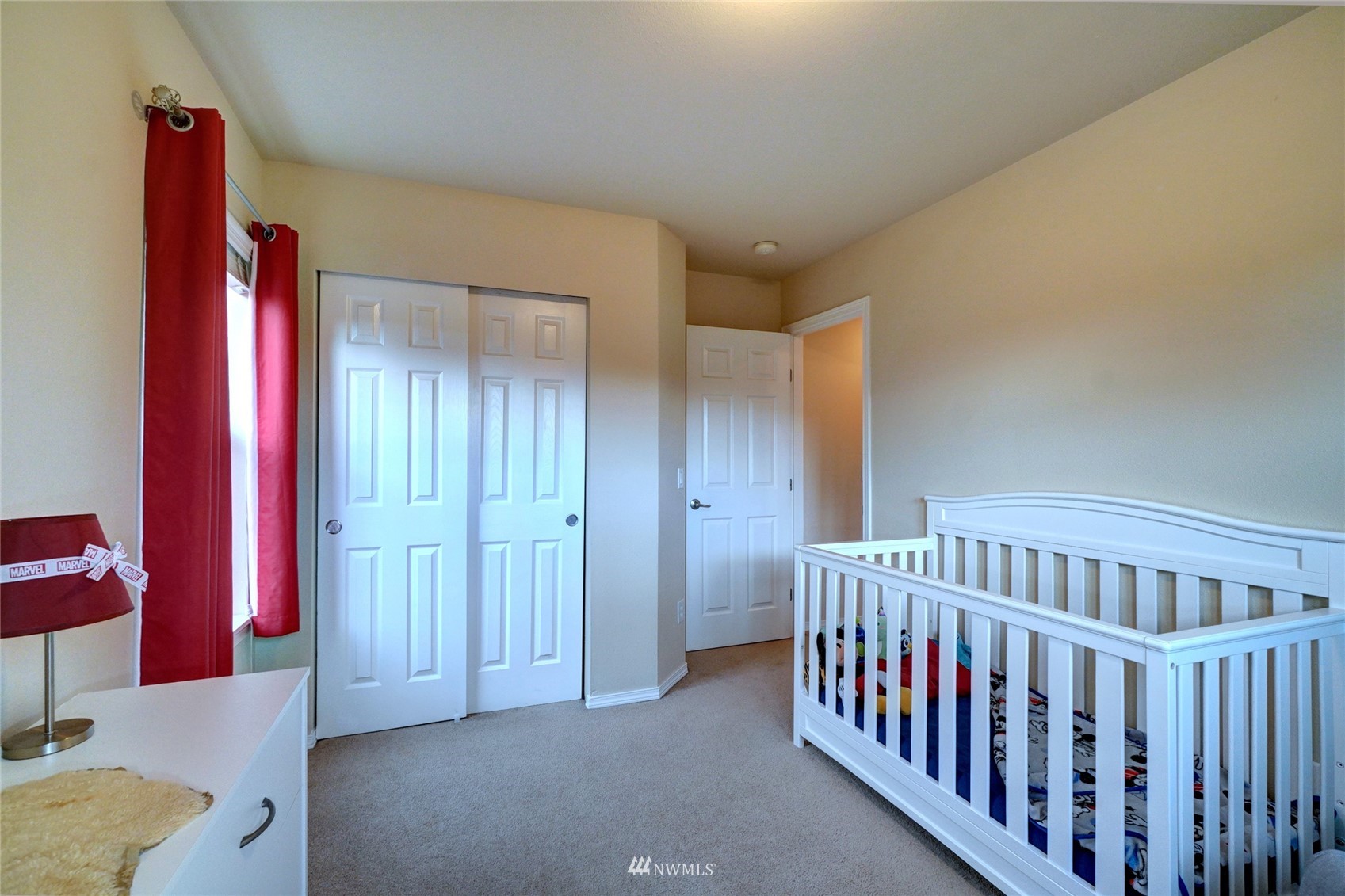 7053 Radius Loop Southeast Lacey, WA 98513 - Photo 32 of 34 a view of a bedroom with furniture and window