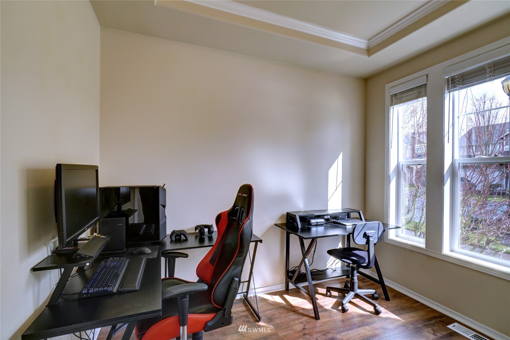 7053 Radius Loop Southeast Lacey, WA 98513 - Photo 4 of 34 a view of a workspace with furniture and a window