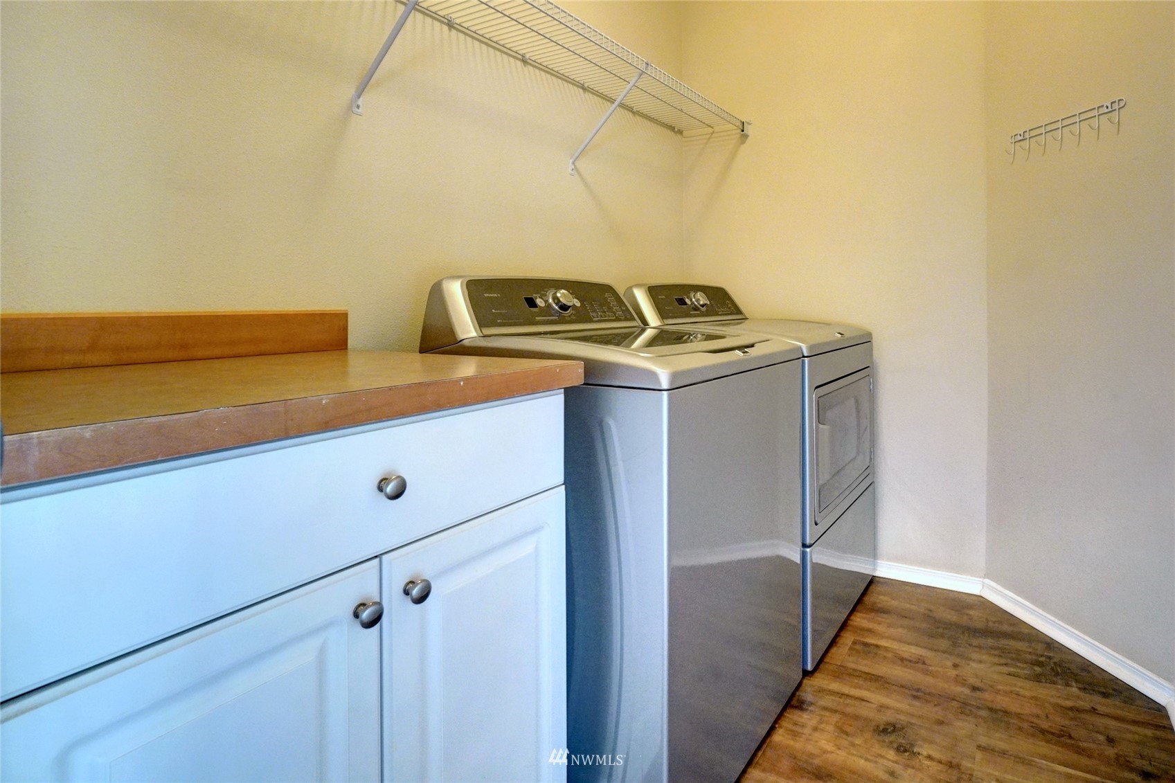 7053 Radius Loop Southeast Lacey, WA 98513 - Photo 8 of 34 a utility room with dryer and washer