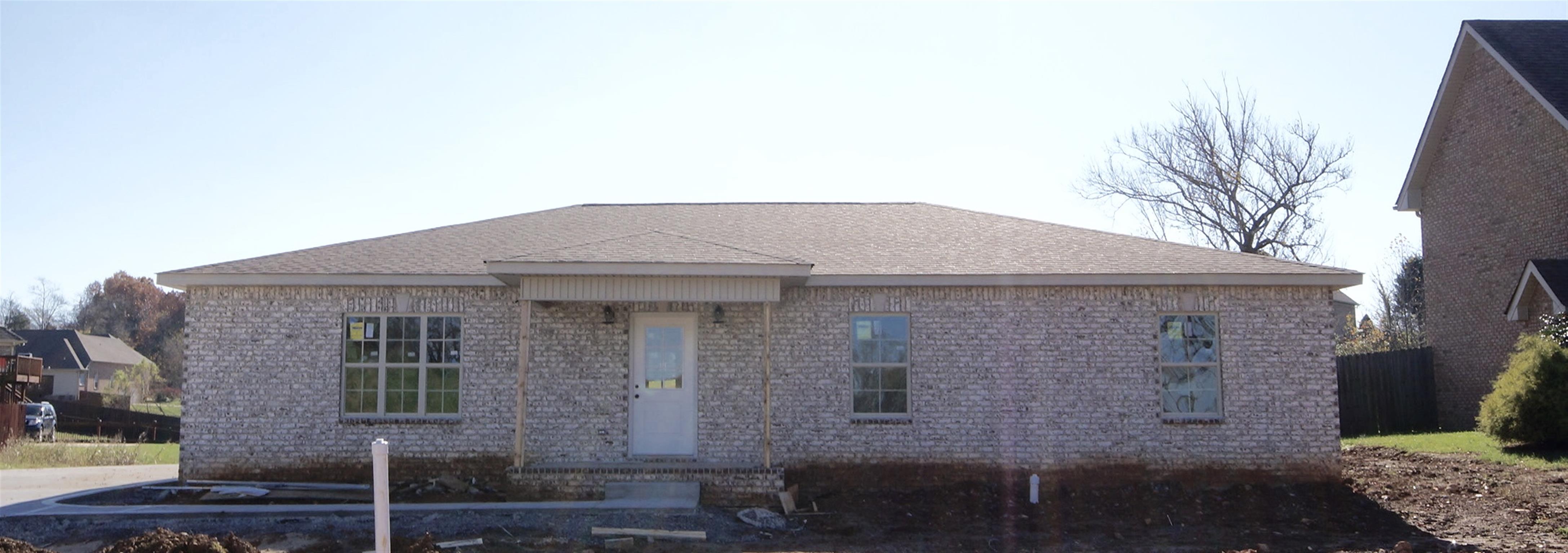 3568 Drake Road Adams, TN 37010 - Photo 1 of 6 a front view of a house with plants