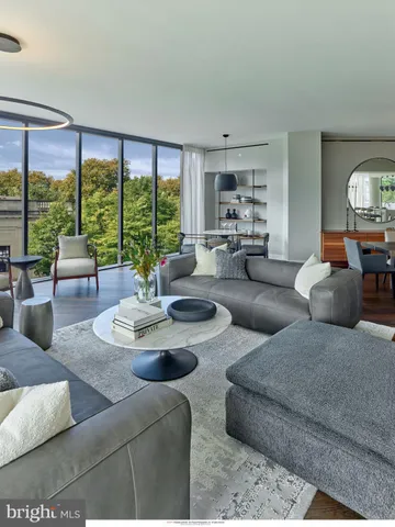 a bathroom with a bathtub shower sink and toilet