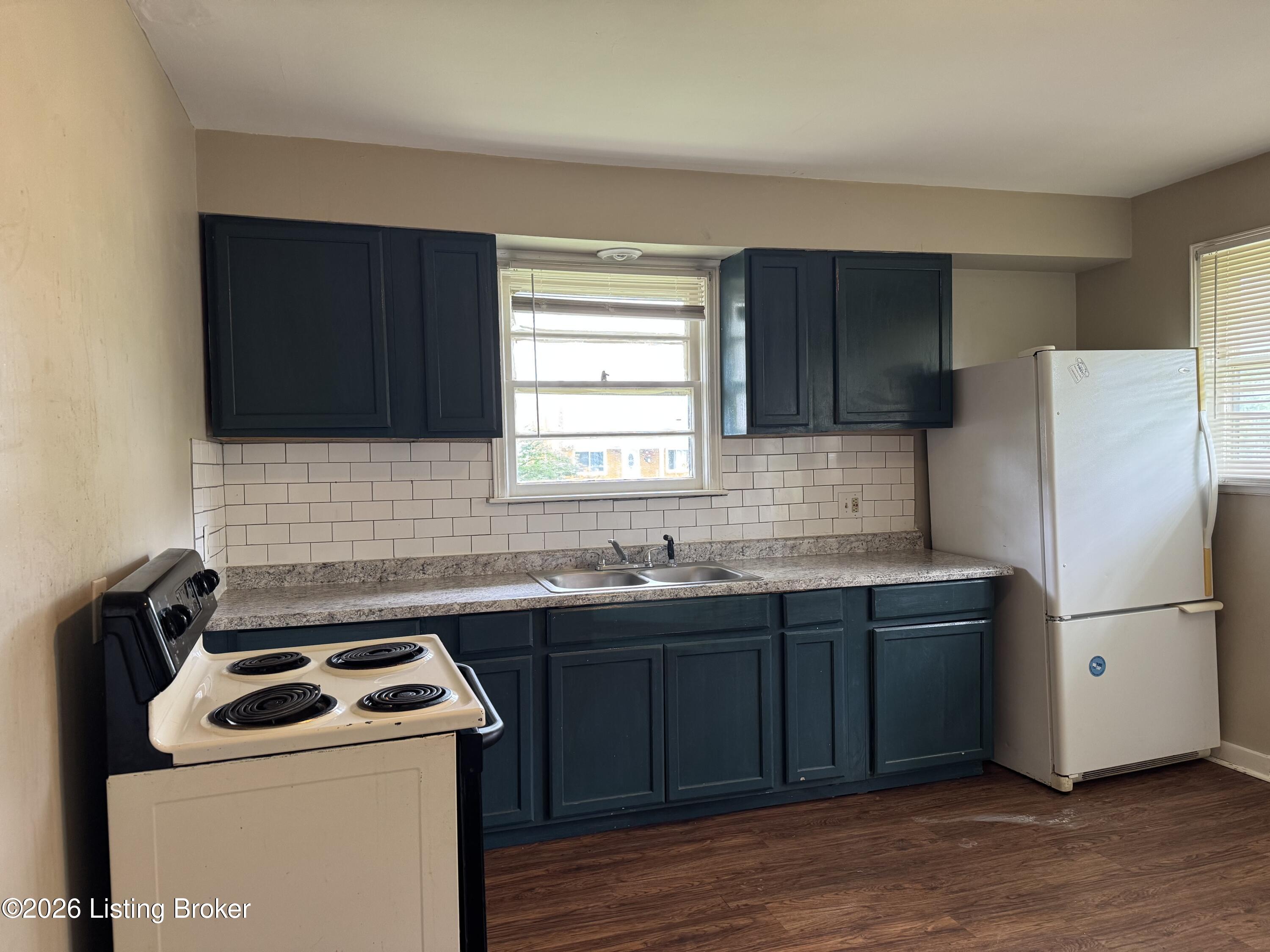 205 Alreva Road Louisville, KY 40216 - Photo 11 of 42 Very large space. A special kitchen area could be created here.