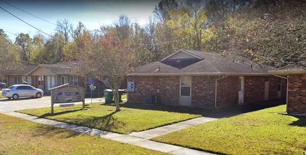 a view of a backyard of the house