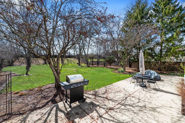 a view of a sitting area with furniture and garden