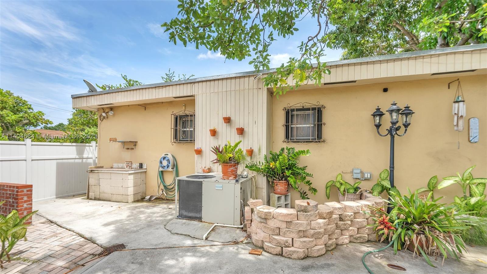 3333 Southwest 1st Street Miami, FL 33135 - Photo 22 of 70 a view of a backyard with plants and outdoor seating
