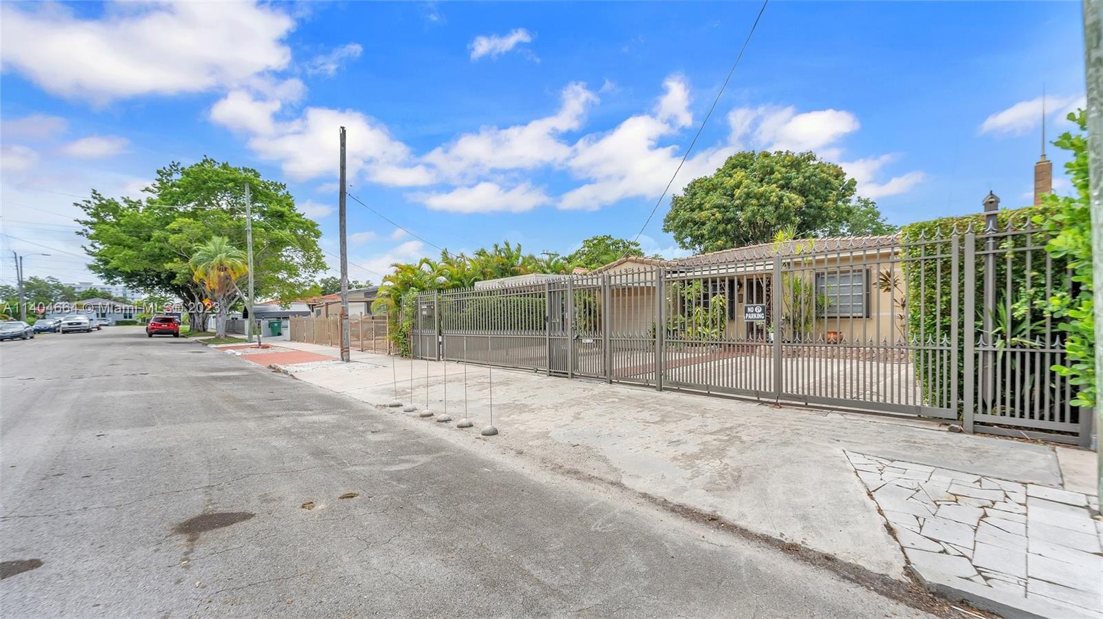 3333 Southwest 1st Street Miami, FL 33135 - Photo 26 of 70 a view of a house with backyard and sitting area