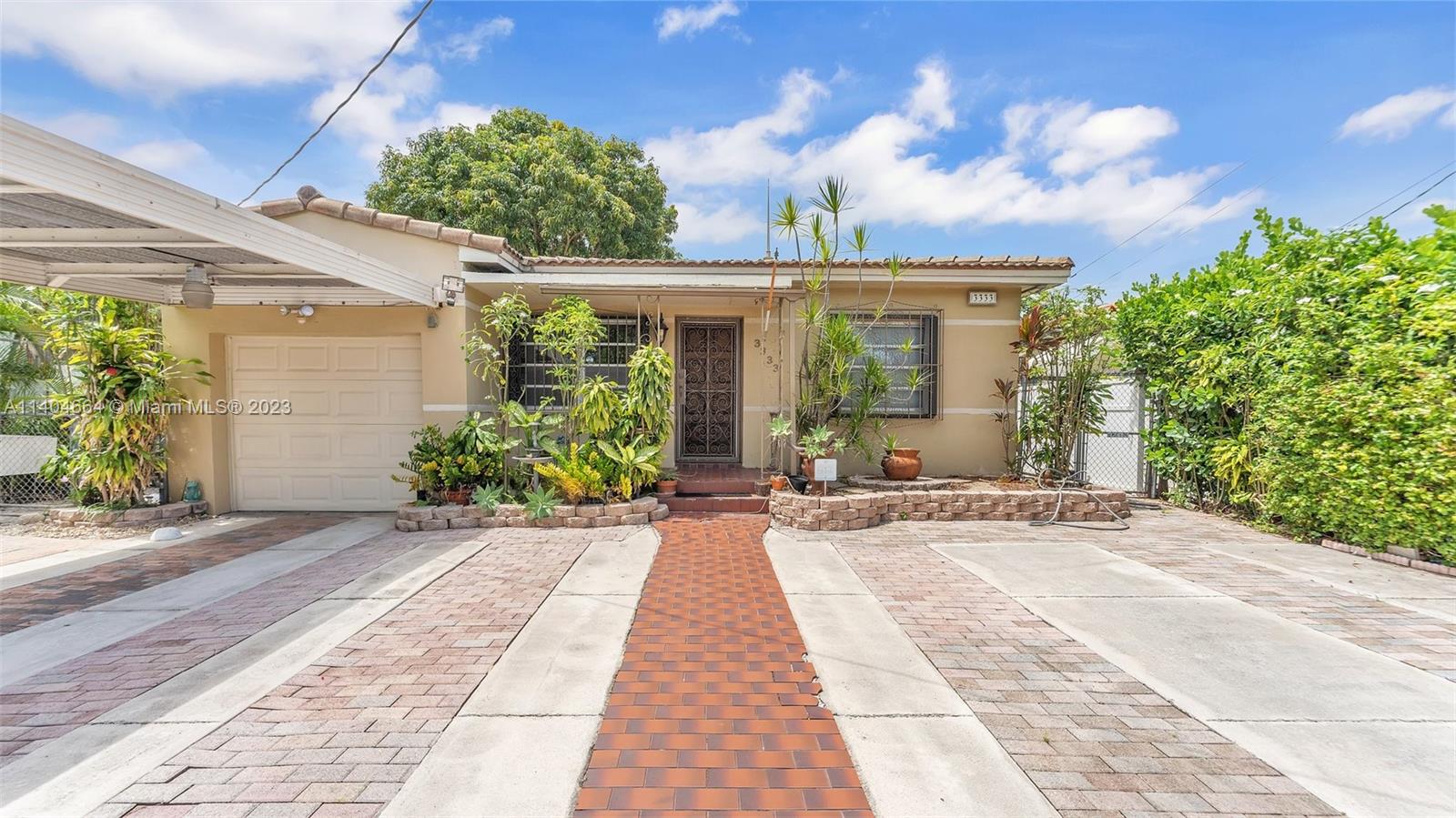 3333 Southwest 1st Street Miami, FL 33135 - Photo 27 of 70 front view of a house with a porch