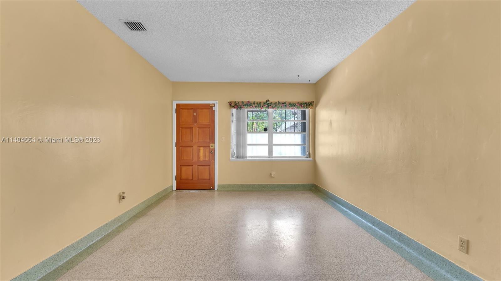 3333 Southwest 1st Street Miami, FL 33135 - Photo 29 of 70 a view of an empty room with a window