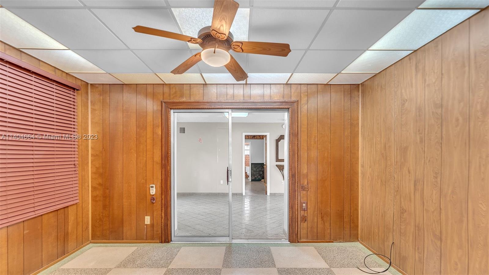 3333 Southwest 1st Street Miami, FL 33135 - Photo 36 of 70 a view of a hallway with a chandelier