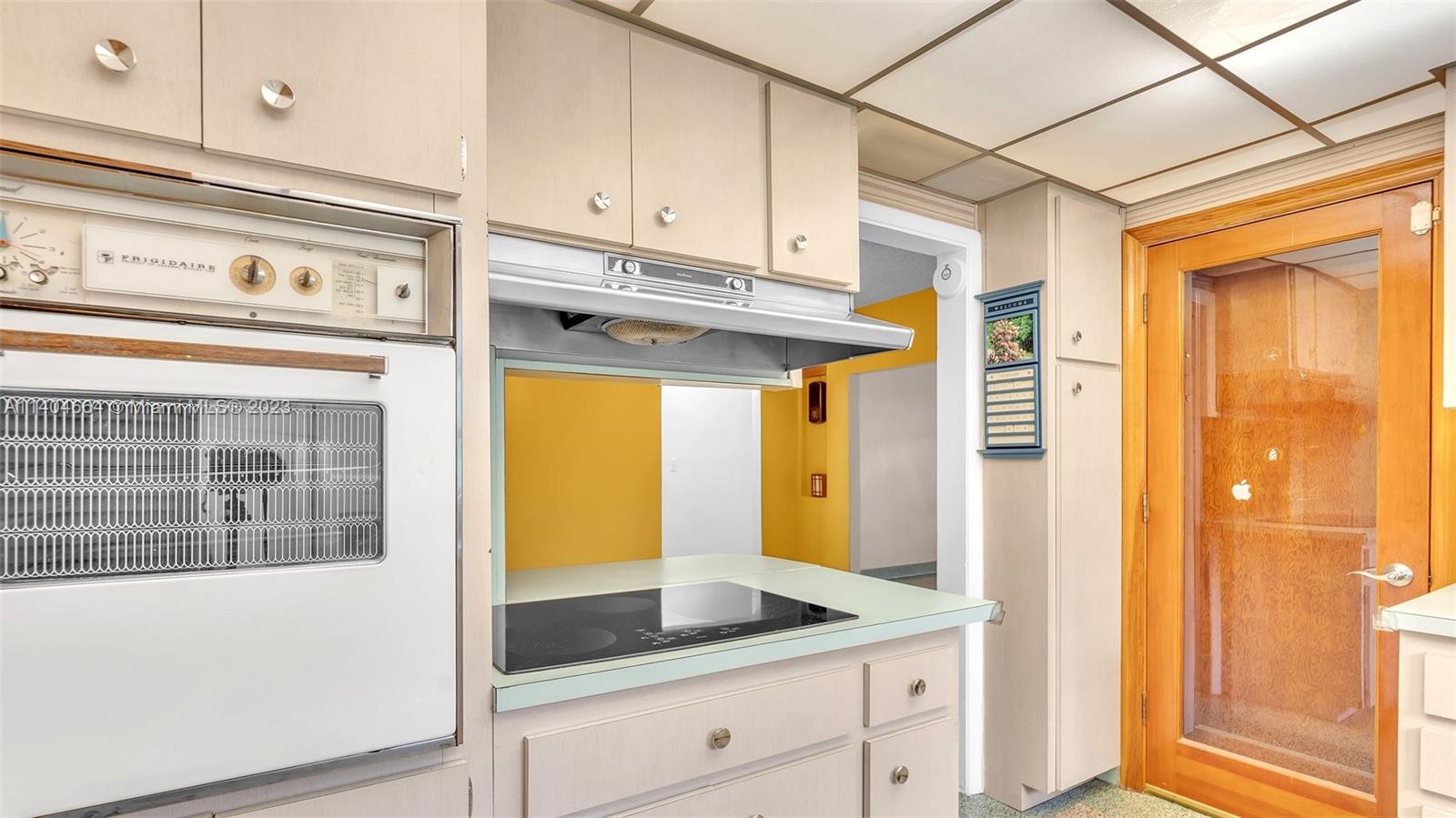 3333 Southwest 1st Street Miami, FL 33135 - Photo 44 of 70 a kitchen with stainless steel appliances granite countertop a refrigerator and a sink