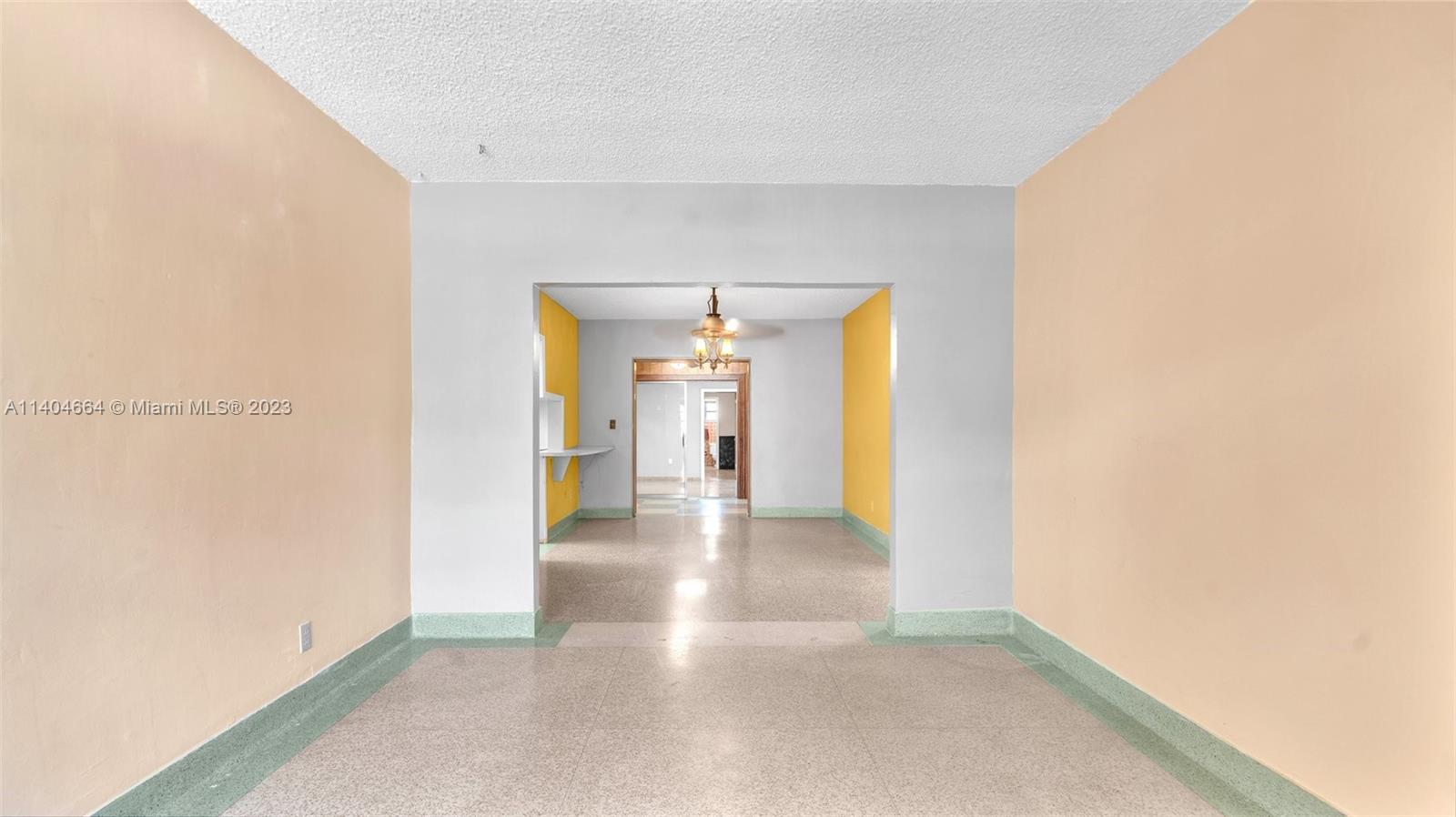 3333 Southwest 1st Street Miami, FL 33135 - Photo 45 of 70 a view of a hallway with wooden floor