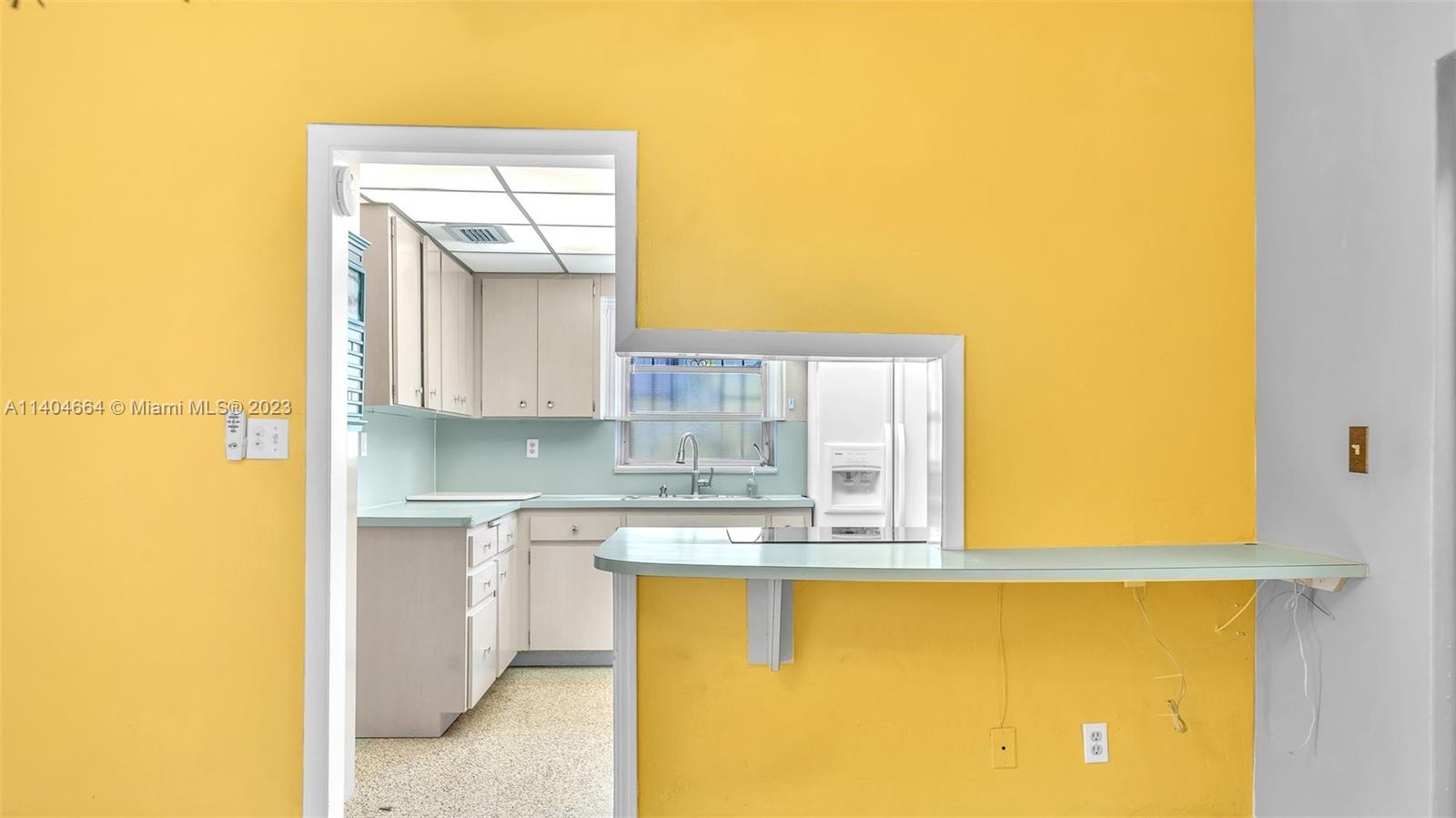 3333 Southwest 1st Street Miami, FL 33135 - Photo 51 of 70 a bathroom with a sink and a mirror