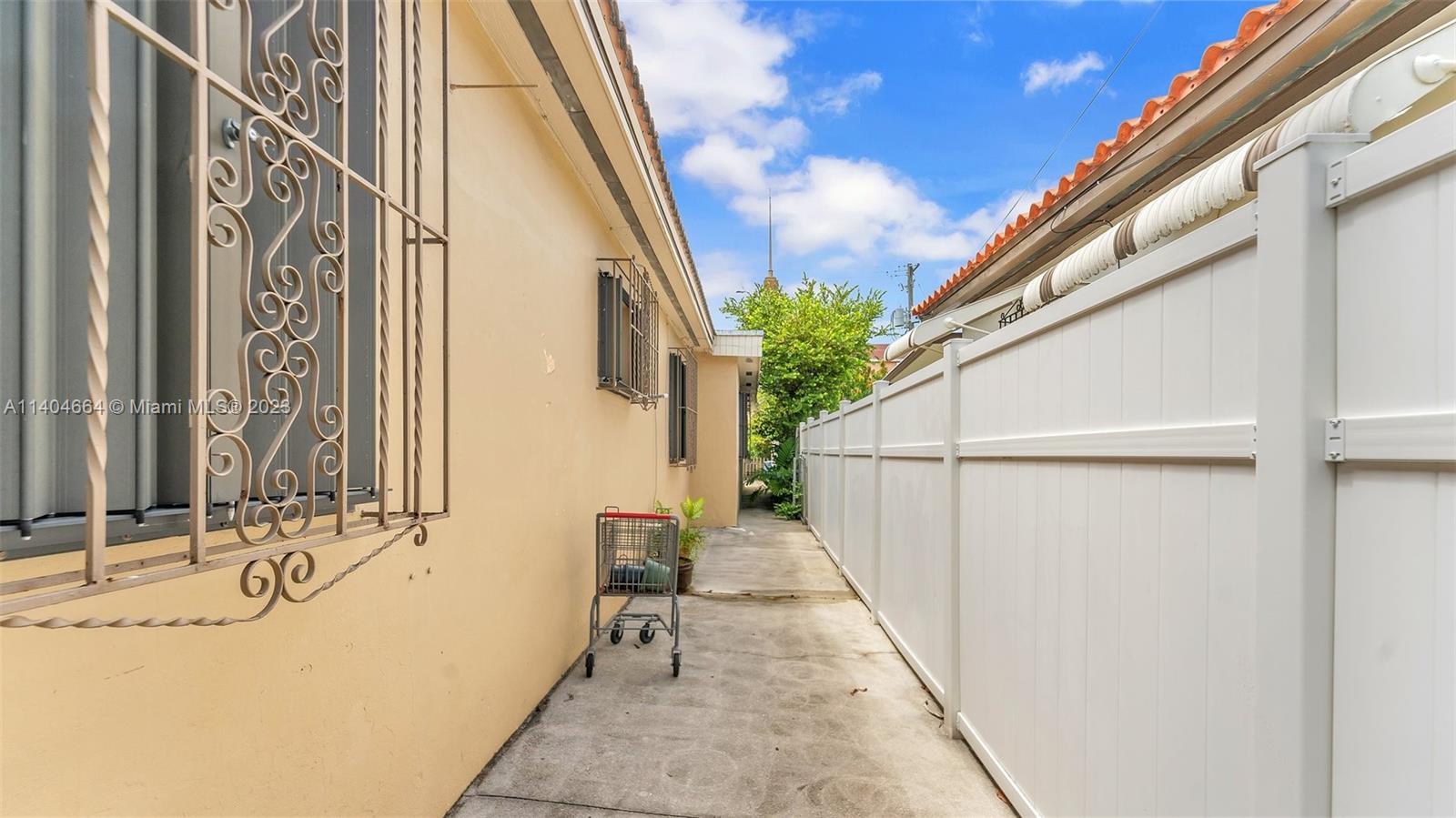 3333 Southwest 1st Street Miami, FL 33135 - Photo 57 of 70 a view of a balcony with wooden floor and stairs