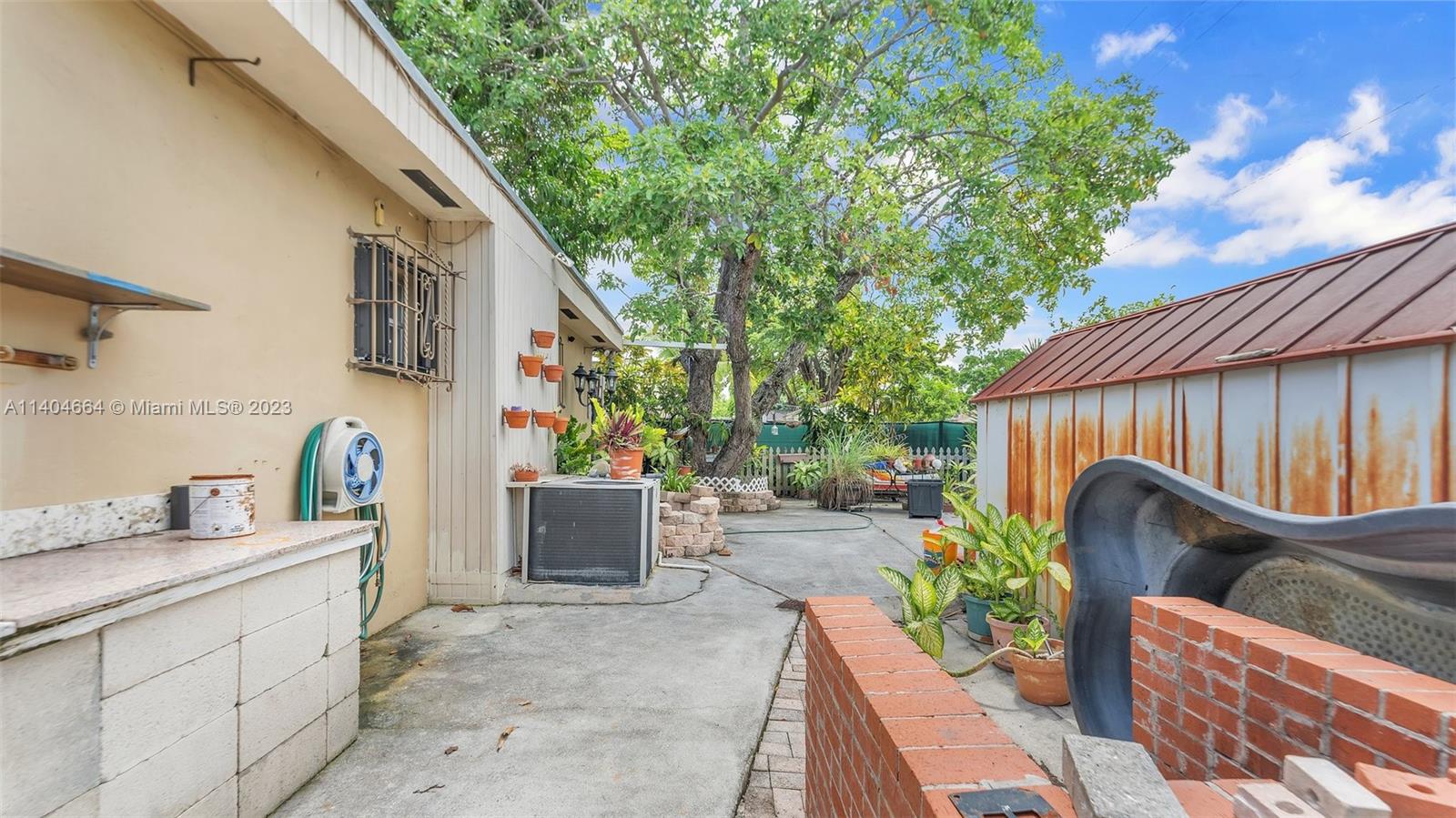 3333 Southwest 1st Street Miami, FL 33135 - Photo 61 of 70 a view of a patio with furniture and a backyard