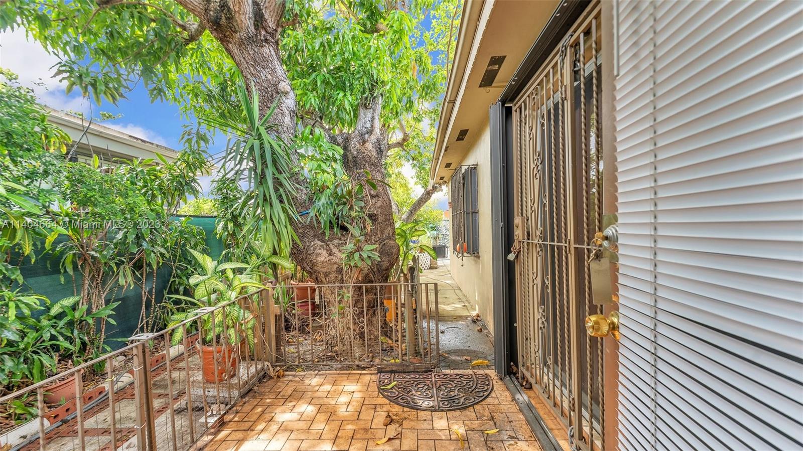 3333 Southwest 1st Street Miami, FL 33135 - Photo 66 of 70 a view of a door and chair
