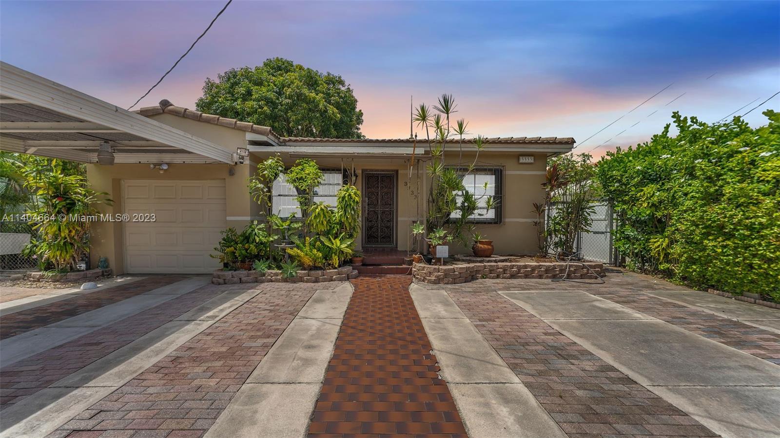 3333 Southwest 1st Street Miami, FL 33135 - Photo 70 of 70 a view of a house with potted plants