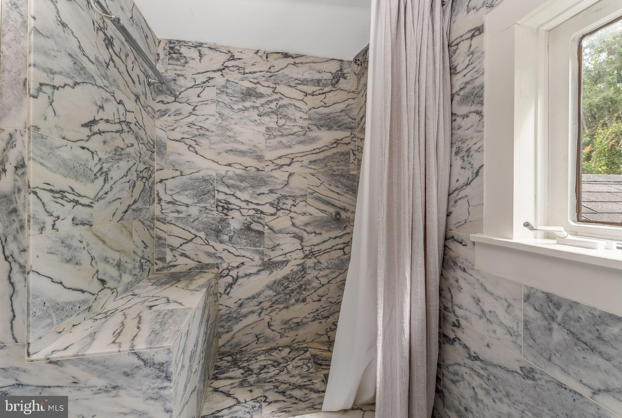 592 Province Line Road Hopewell, NJ 08525 - Photo 28 of 70 a bathroom with a shower curtain