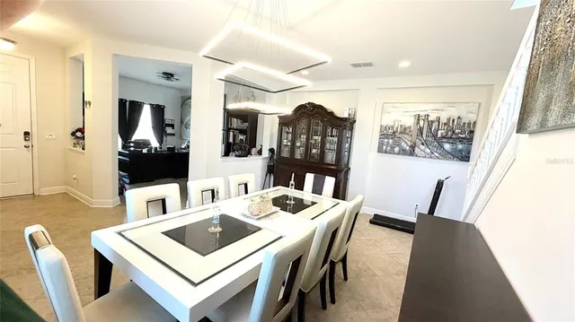 an aerial view of a house with a garden