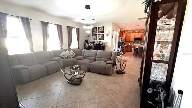 an aerial view of a pool yard swimming pool and outdoor seating