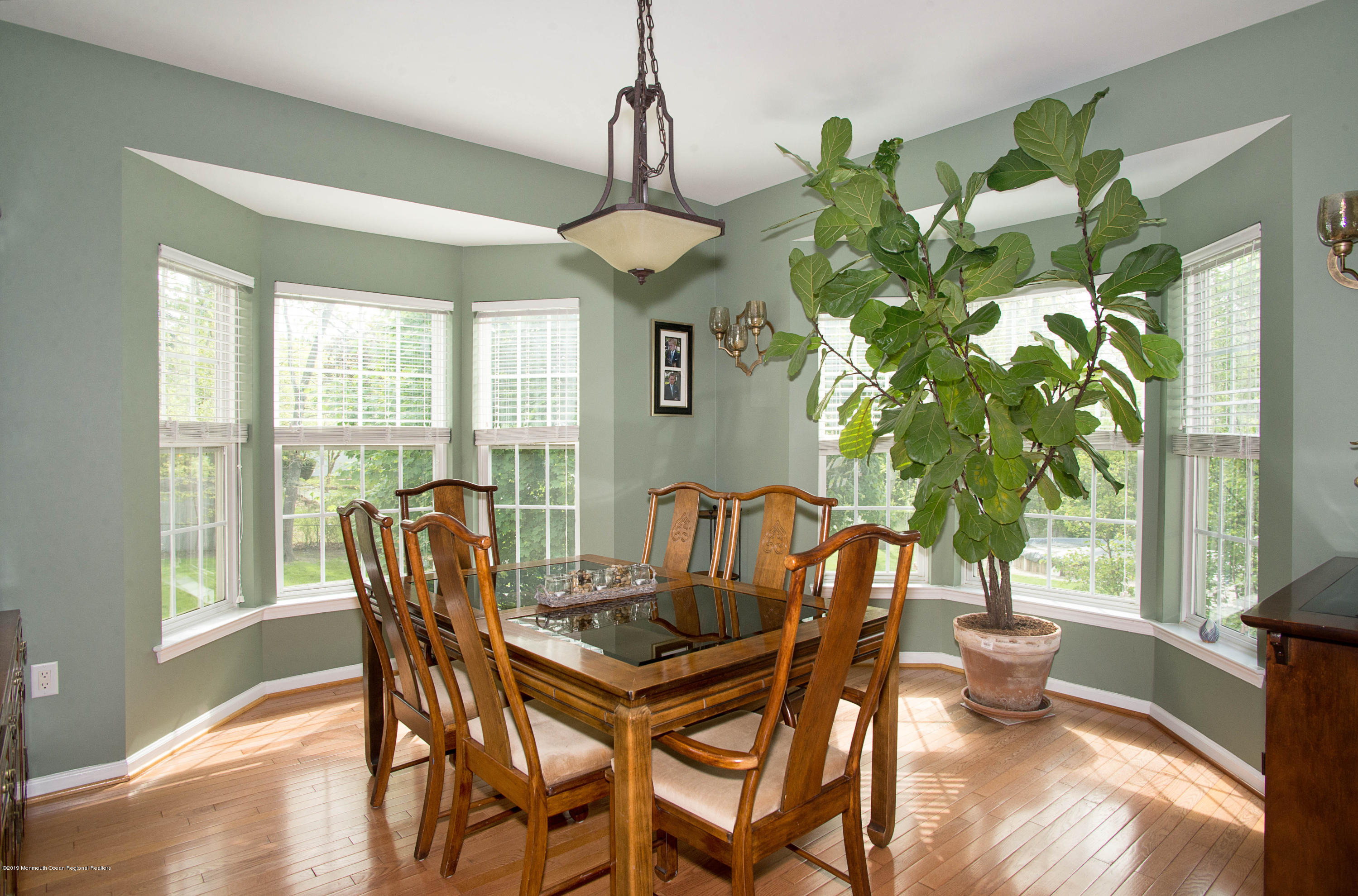 6 Pine Road Howell, NJ 07731 - Photo 14 of 36 a view of a dining room with furniture window and outside view