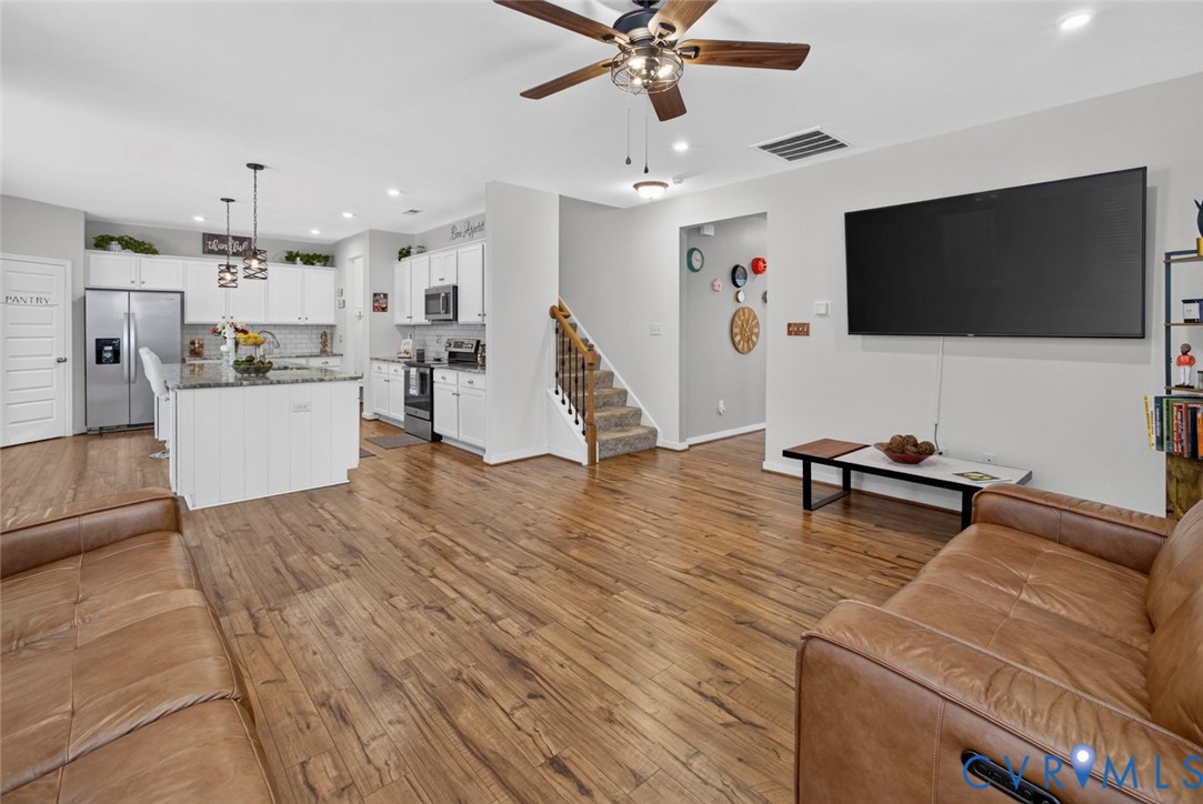 7507 Rouseaux Circle Chesterfield, VA 23832 - Photo 8 of 37 Wood-finish flooring extending throughout the livi