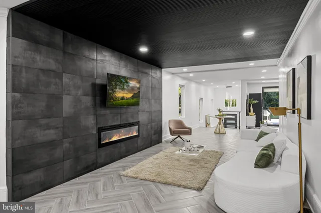 a view of a hallway with seating area