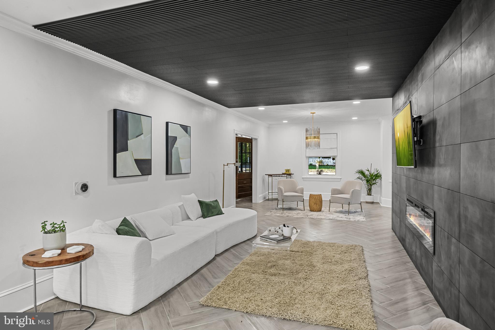 514 East Main Street Moorestown, NJ 08057 - Photo 15 of 60 a living room with furniture and a fireplace