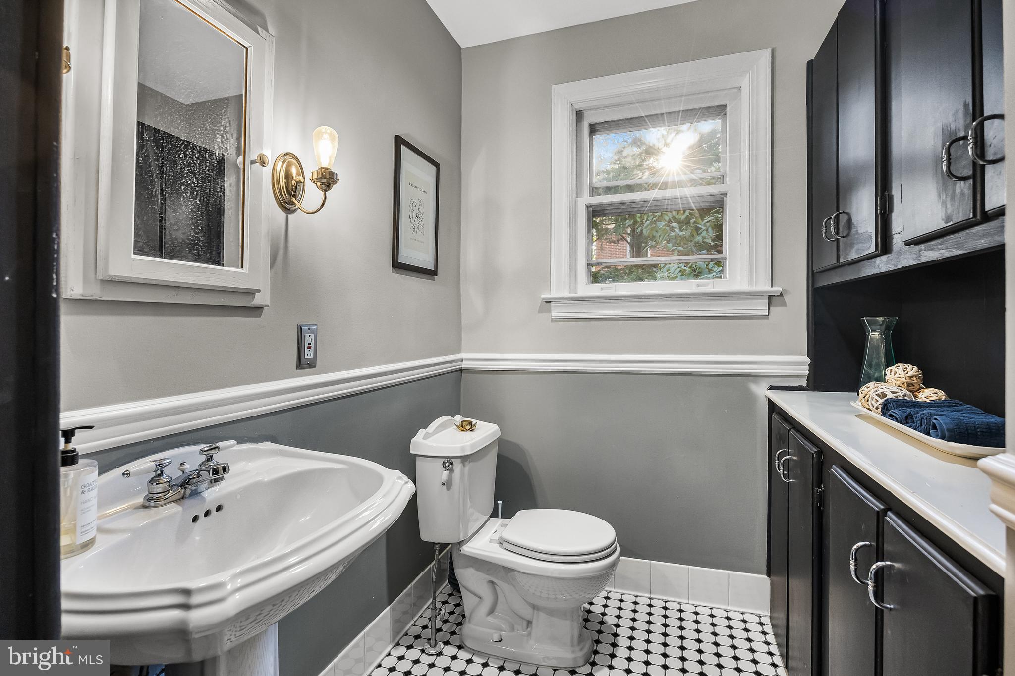 514 East Main Street Moorestown, NJ 08057 - Photo 19 of 60 a bathroom with a sink toilet and window