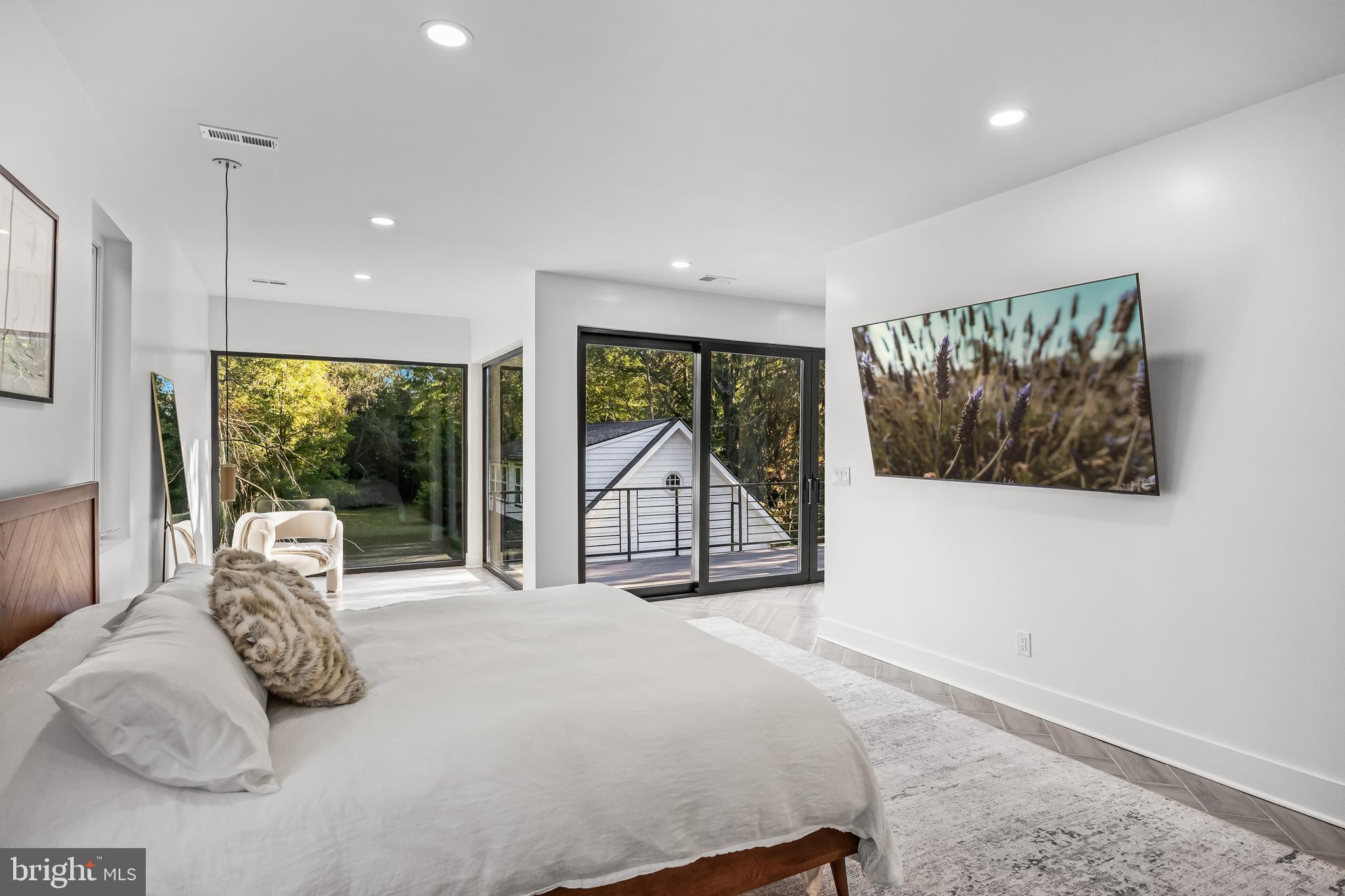514 East Main Street Moorestown, NJ 08057 - Photo 24 of 60 a bedroom with a large bed and a large window