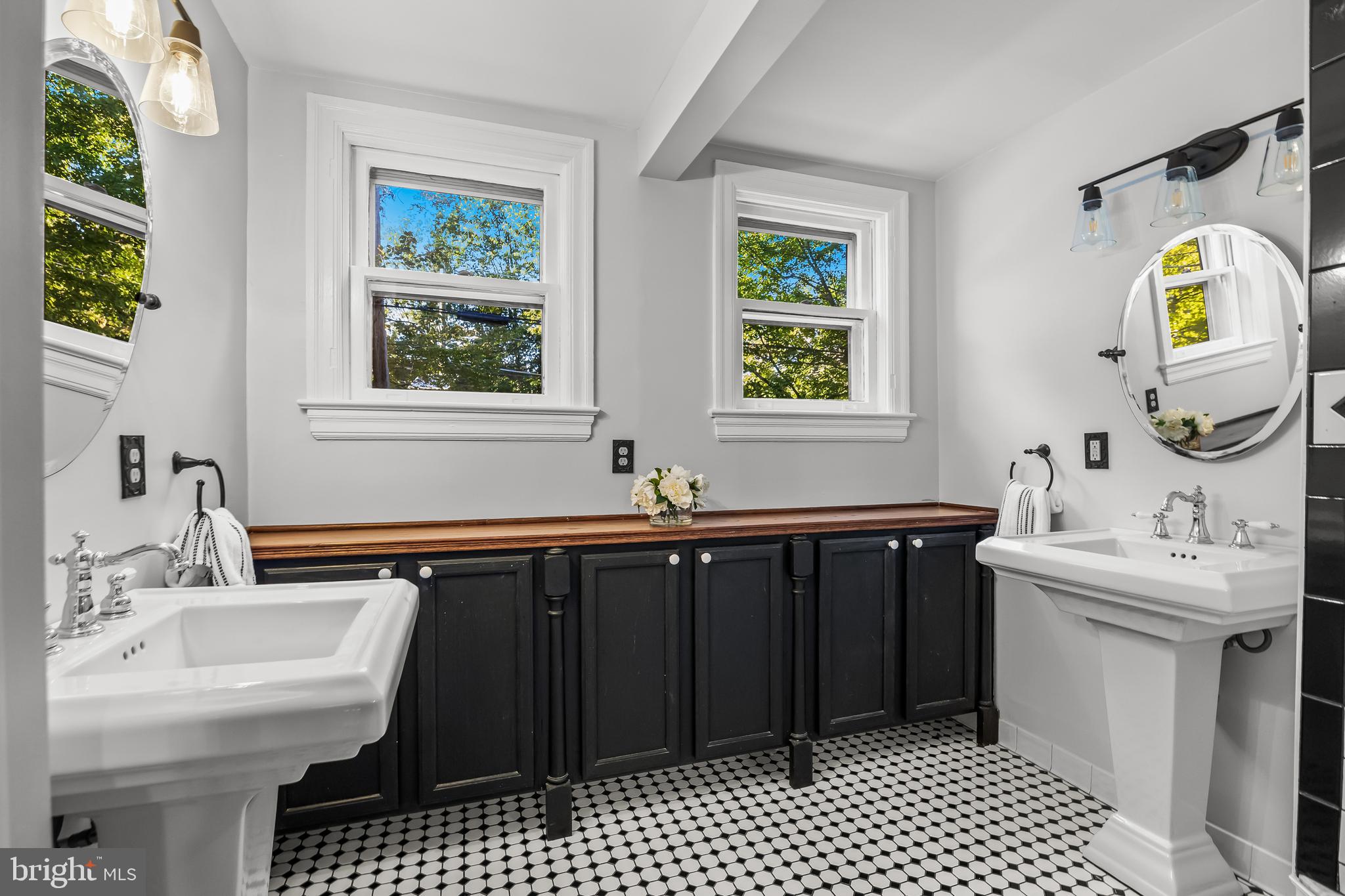 514 East Main Street Moorestown, NJ 08057 - Photo 39 of 60 a bathroom with a sink and a mirror