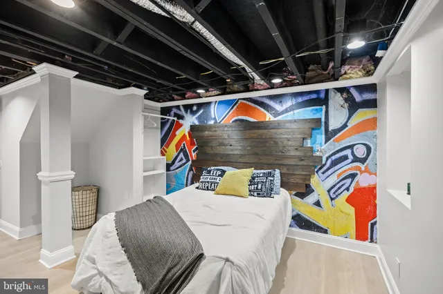 an aerial view of a residential houses with yard