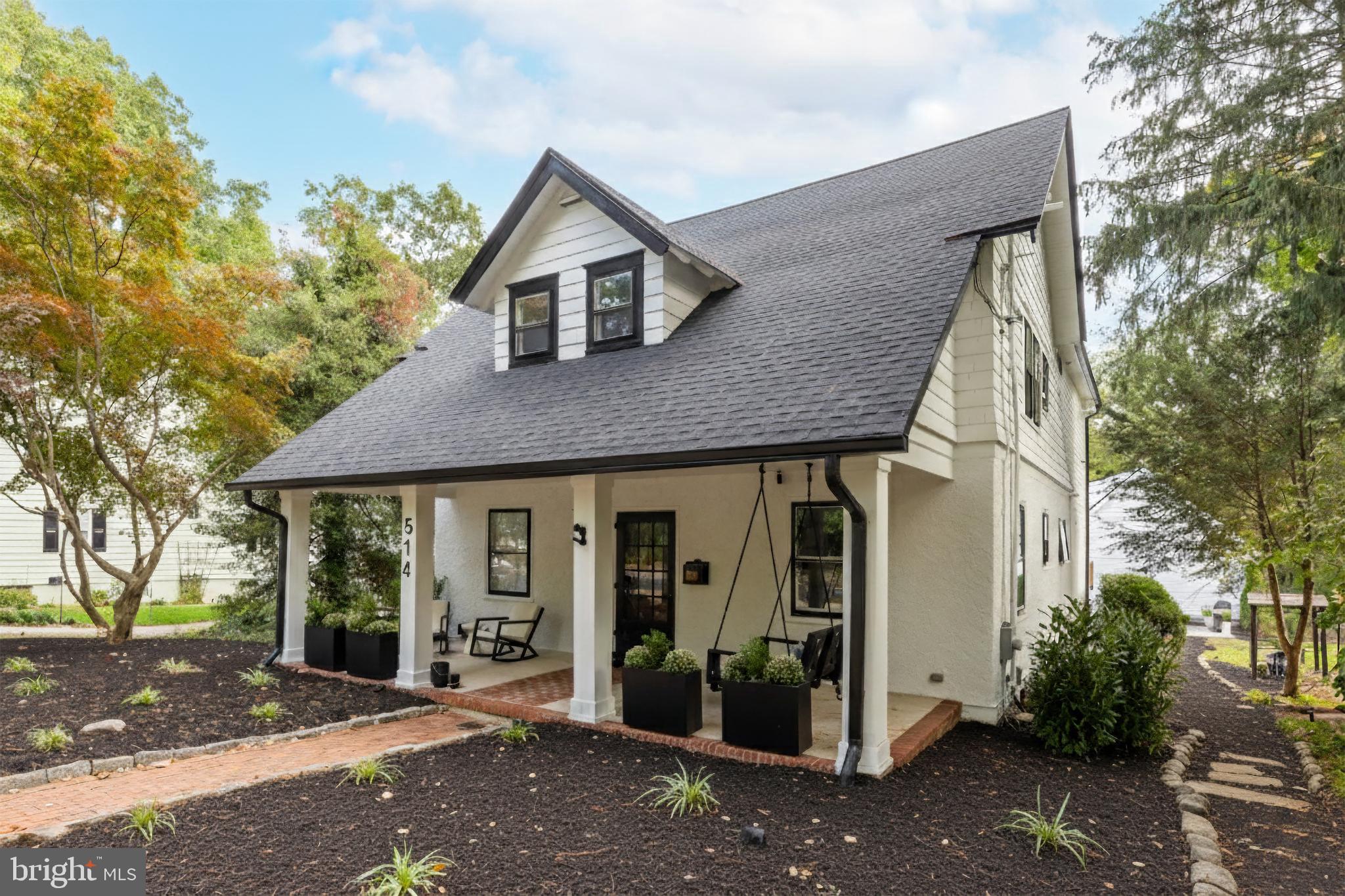 514 East Main Street Moorestown, NJ 08057 - Photo 55 of 60 a front view of a house with garden