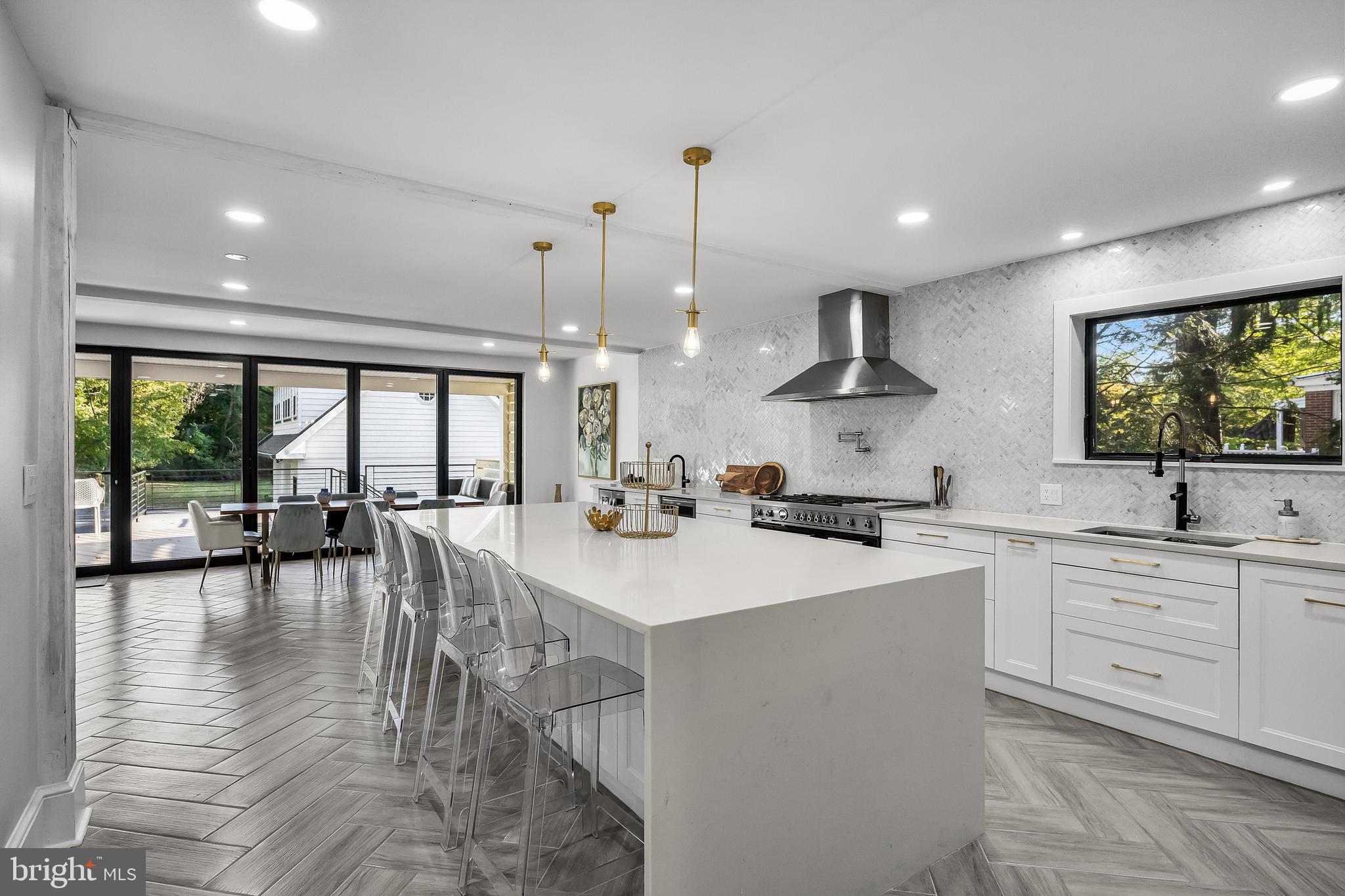 514 East Main Street Moorestown, NJ 08057 - Photo 9 of 60 a kitchen with lots of counter space a sink appliances and a large window
