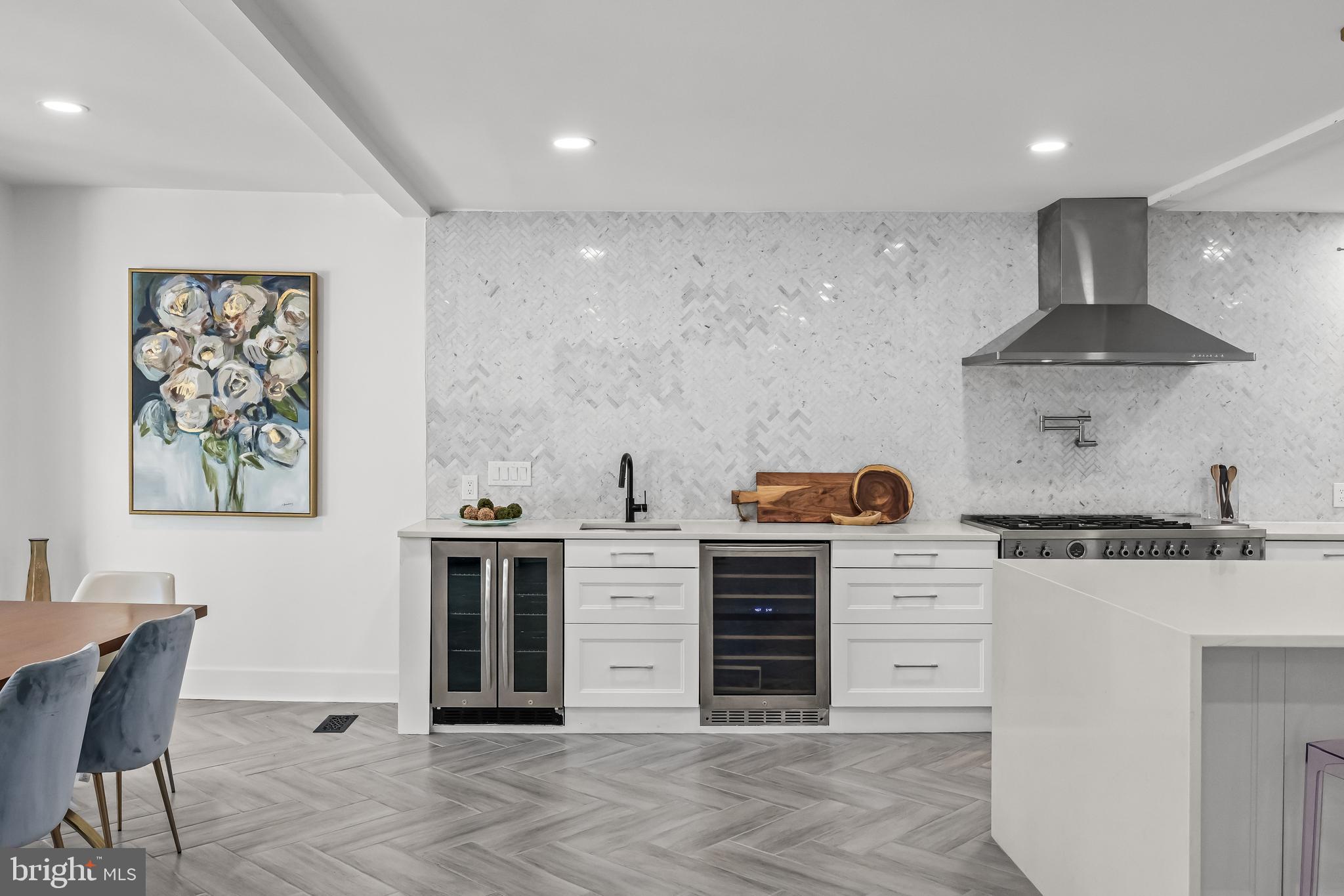 514 East Main Street Moorestown, NJ 08057 - Photo 10 of 60 a kitchen with stainless steel appliances a stove and a refrigerator