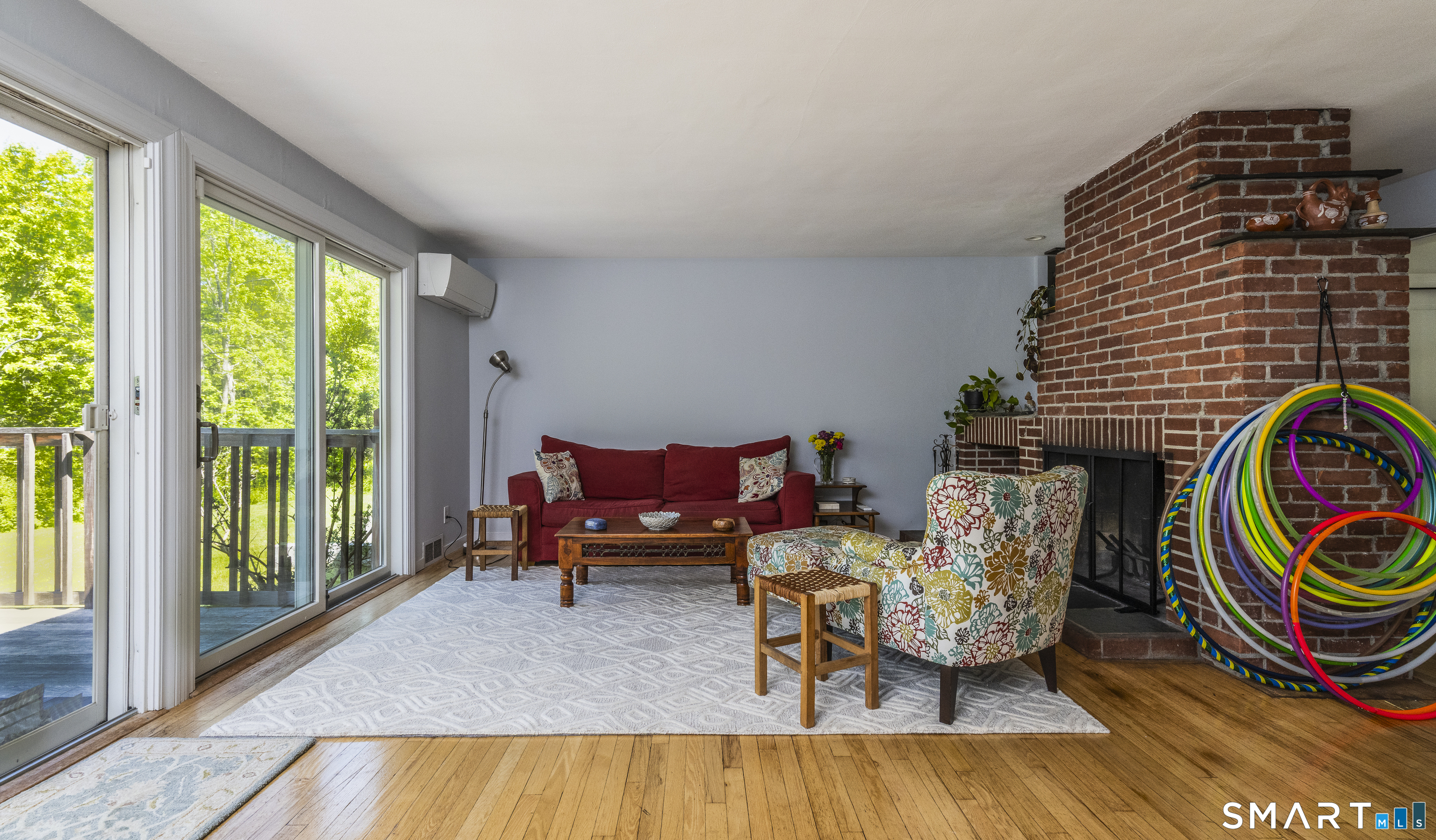 7 Chimney Rock Road Kent, CT 06757 - Photo 22 of 35 a living room with furniture and a wooden floor